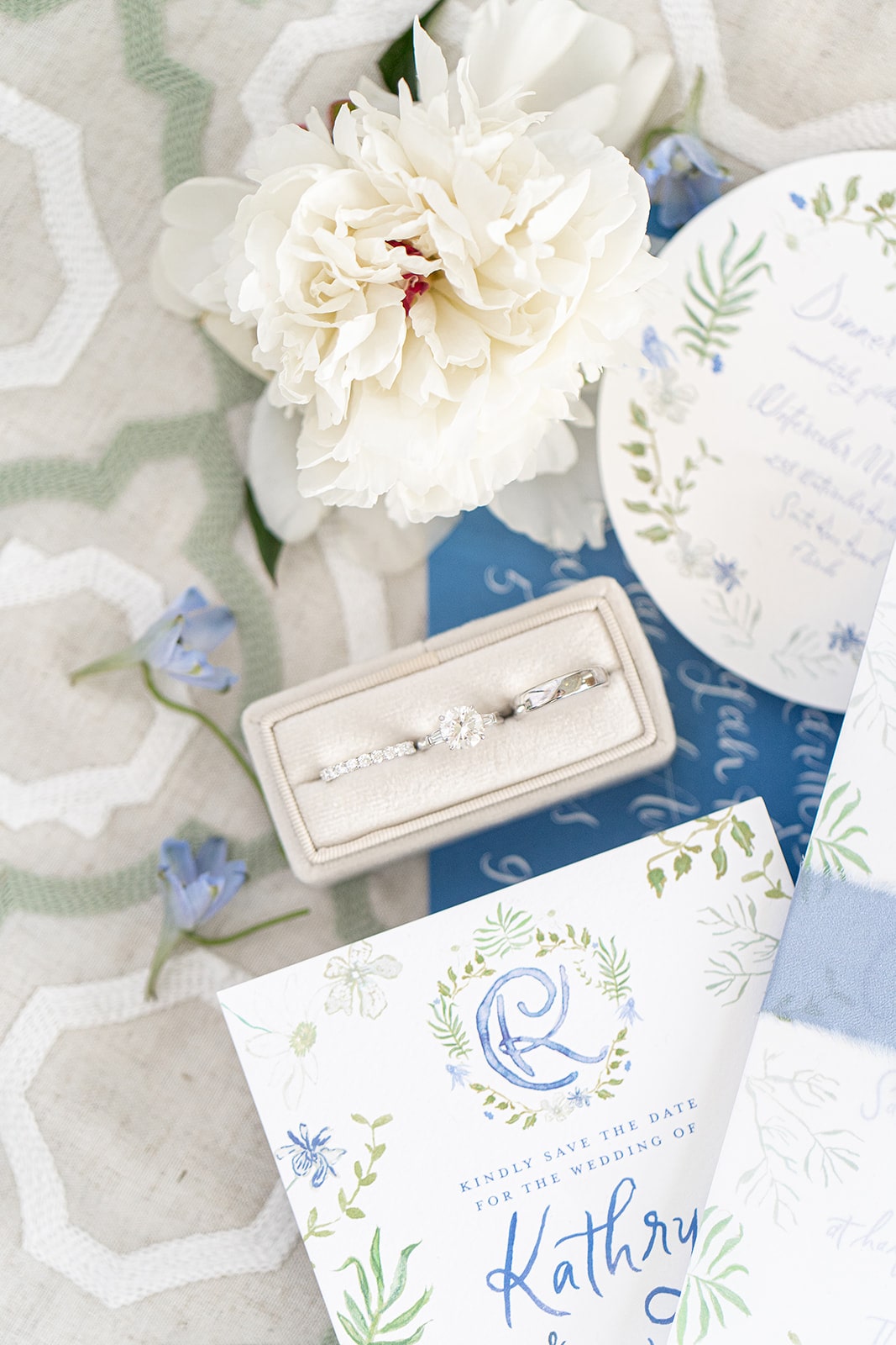 White gold wedding rings and wedding stationery