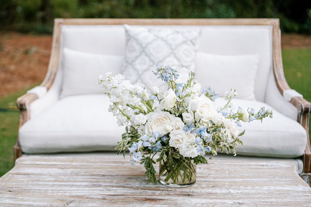 Blue and white wedding flowers at wedding lounge