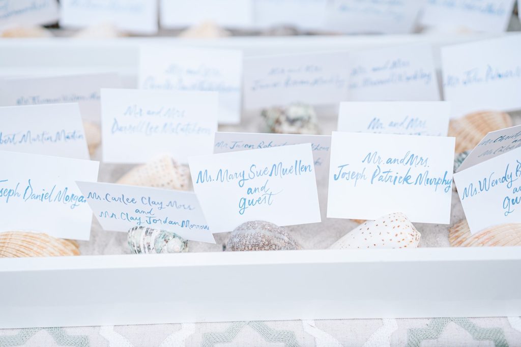 Wedding escort cards with shell stands