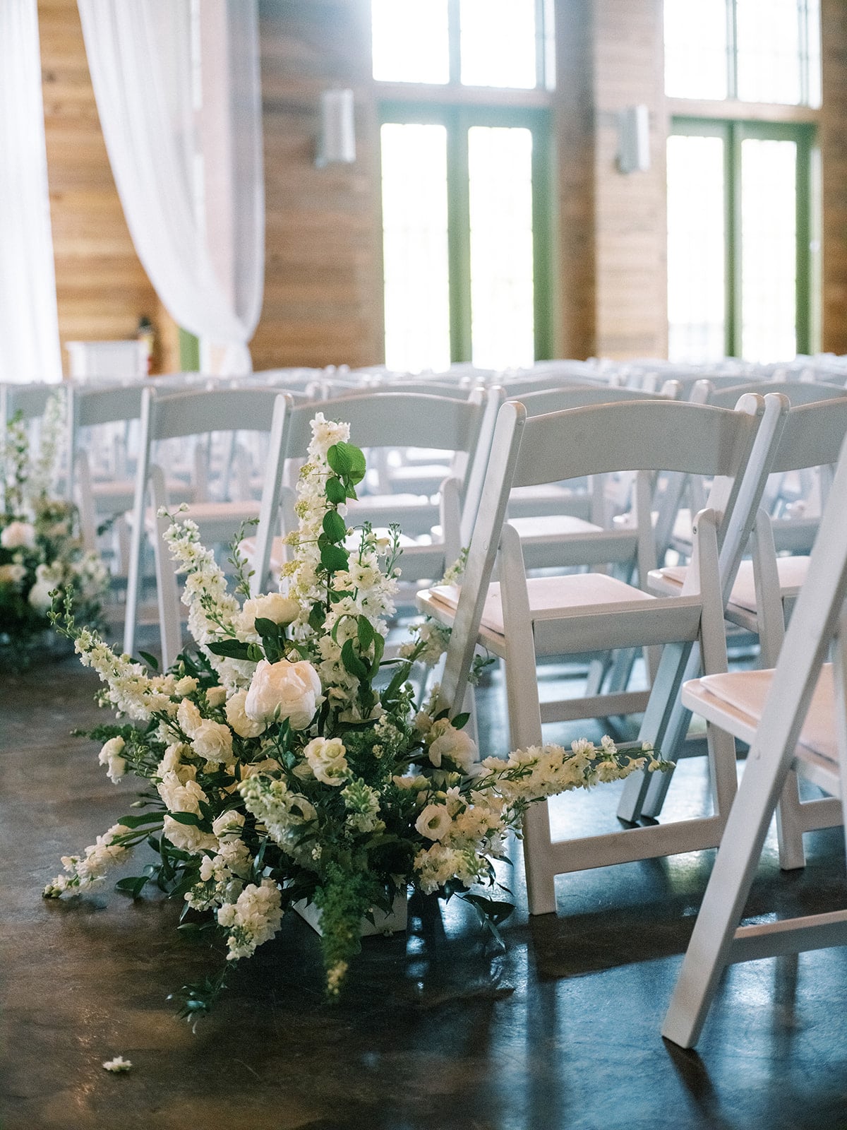 White wedding ceremony at WaterColor Lakehouse