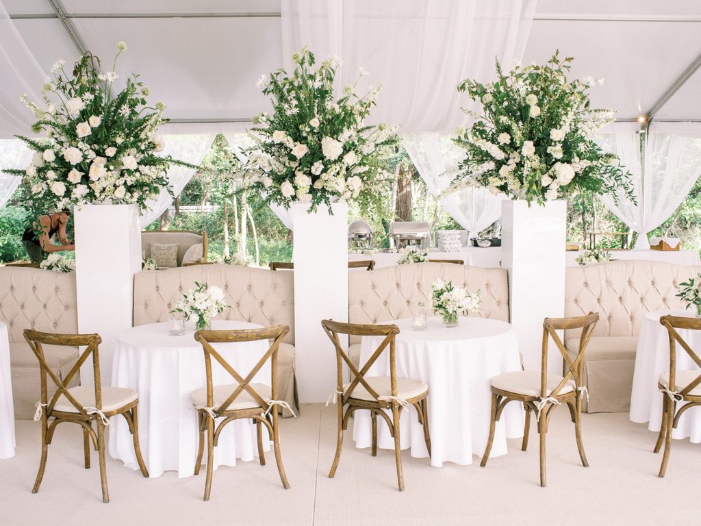 Tented wedding with banquette seating