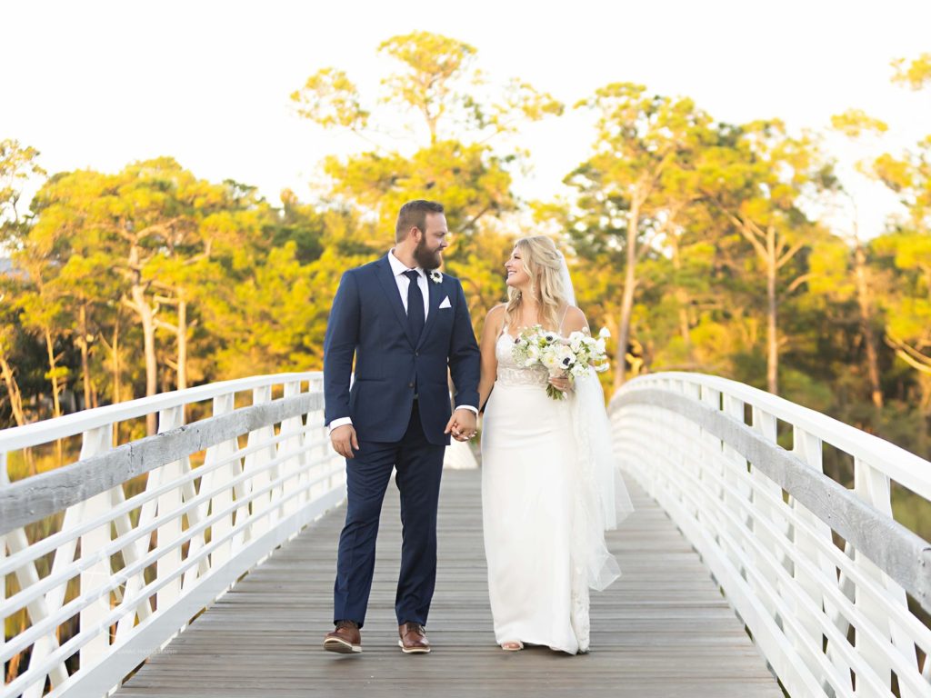 Bride and groom on a bridge
