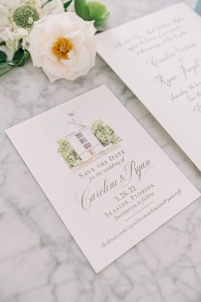 Calligraphy wedding invitations with watercolor painting of a church