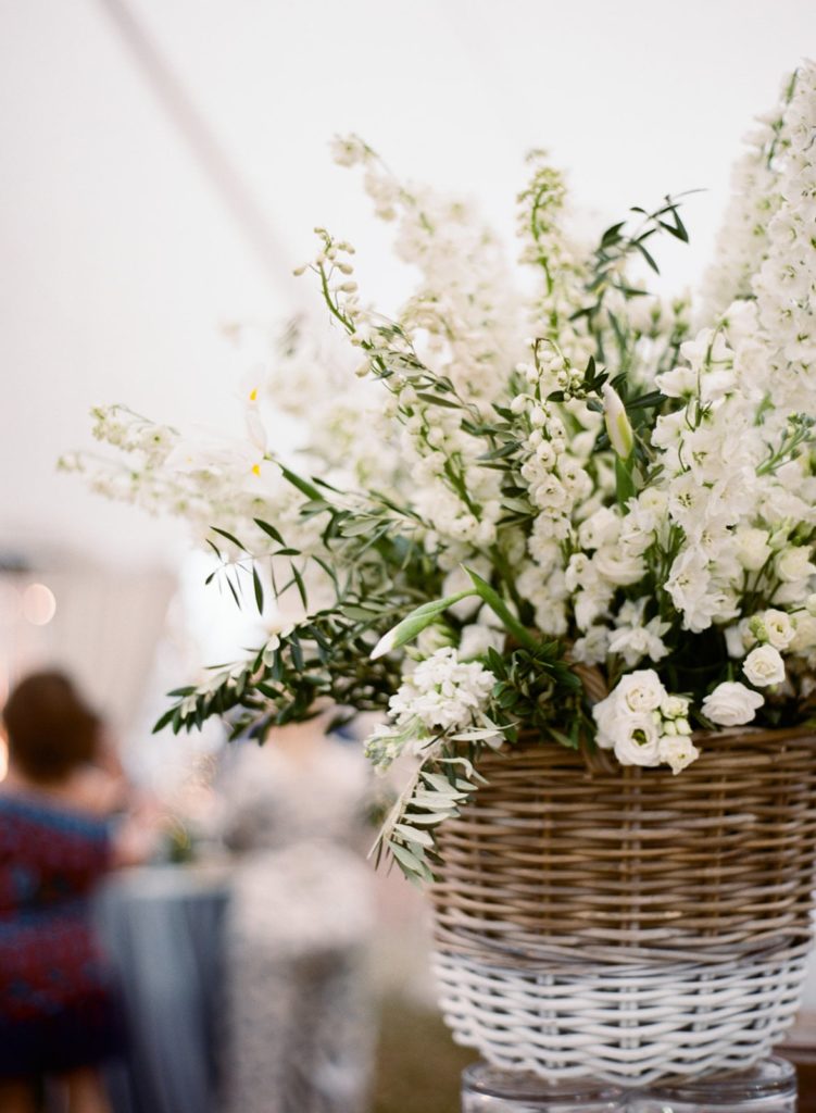 White flowers in wicker basket
