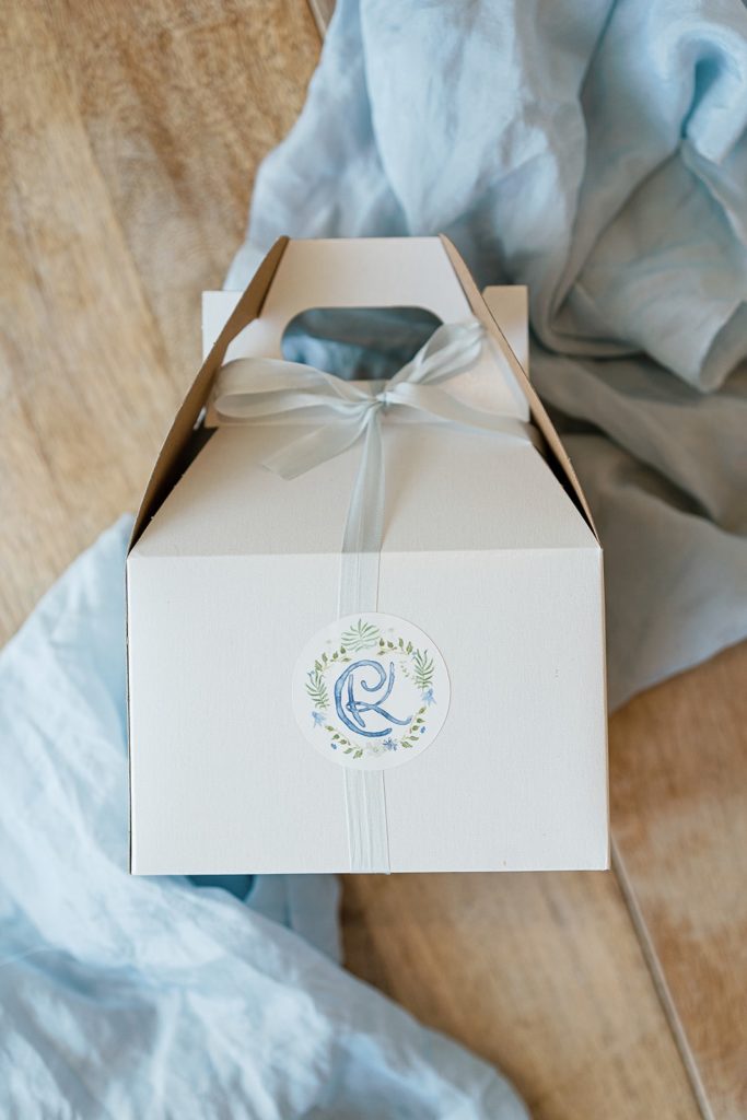 White wedding welcome gift box with blue monogram
