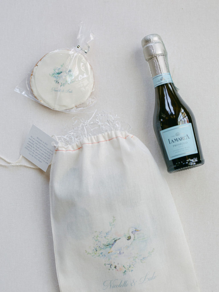 custom cookie & champagne with small cloth bag