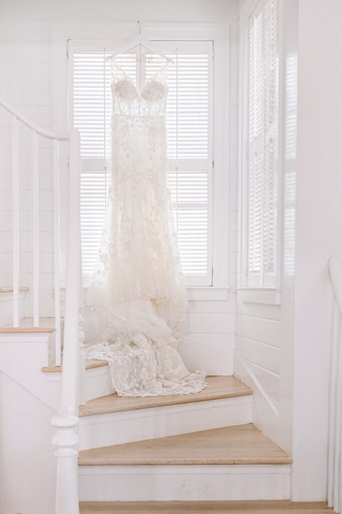 Lace wedding dress hanging window