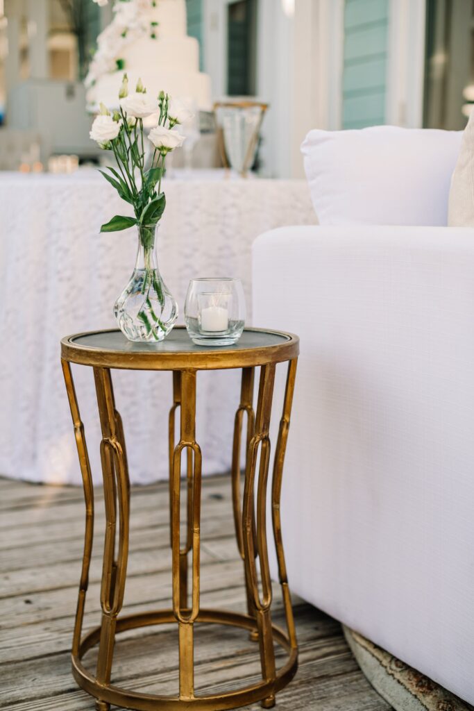 White wedding lounge with wood table