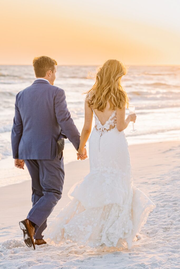 Bride and groom sunset photo on the beach