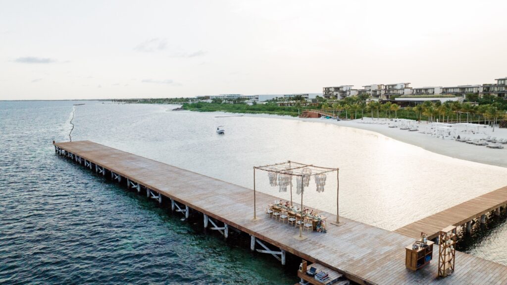 Private dinner on dock at destination wedding venue in Mexico